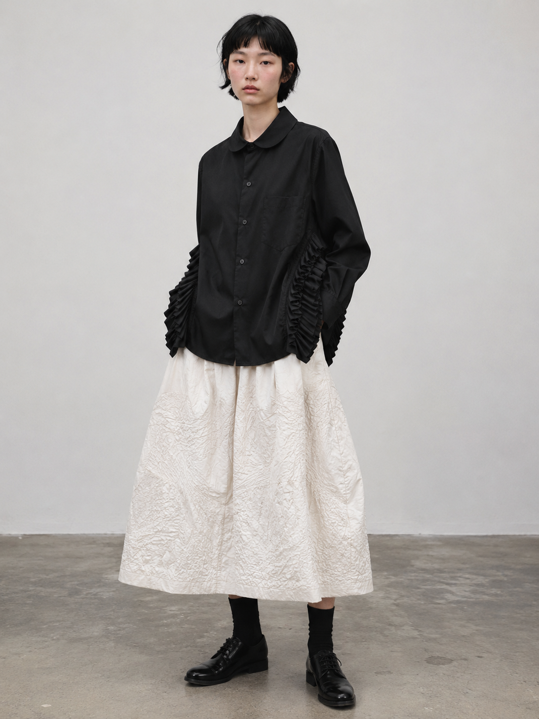 CDG Tao Black Ruffle Blouse